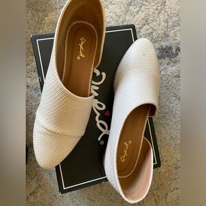 Cream booties. Never worn. Excellent condition